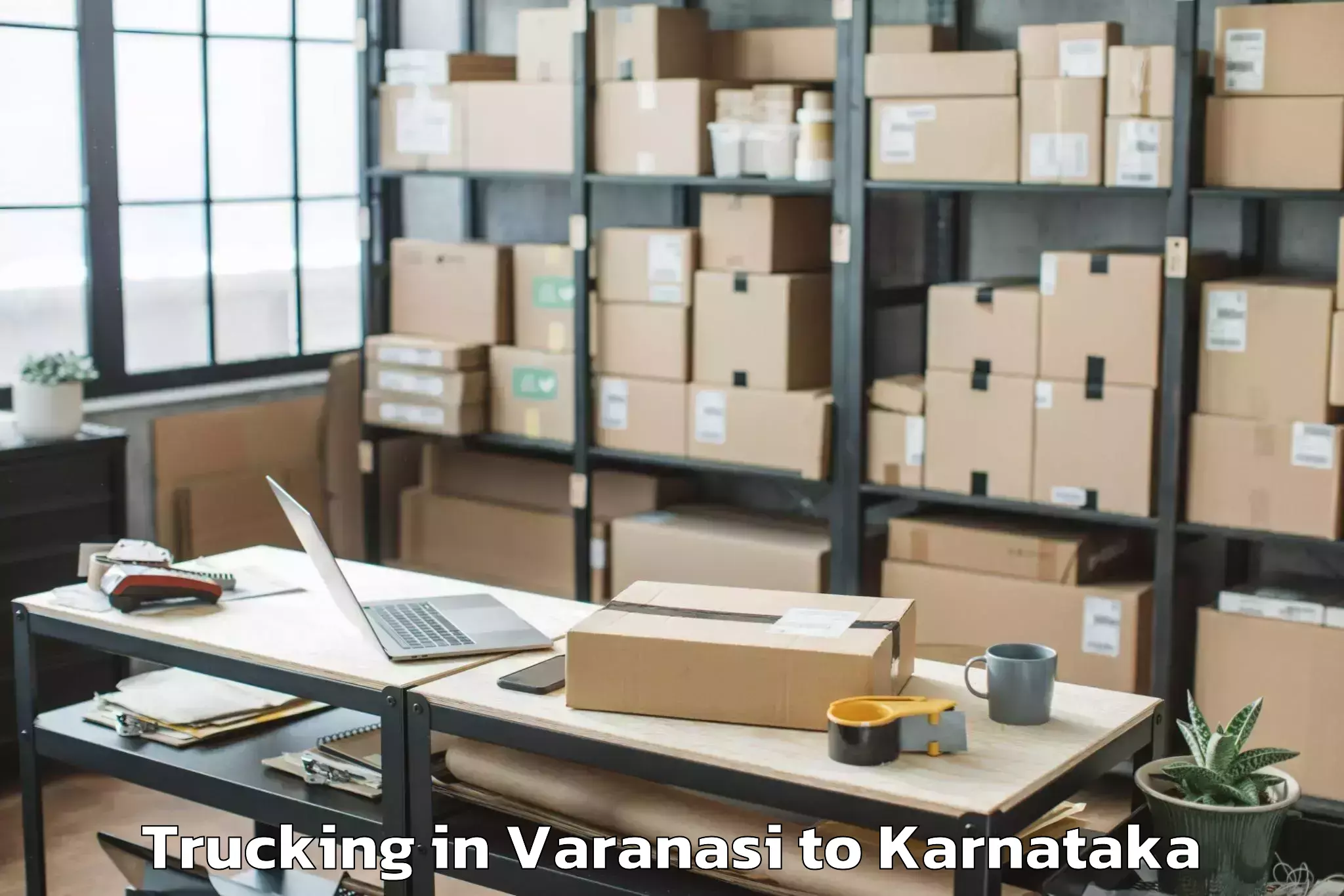 Reliable Varanasi to Karnataka State Law University Trucking